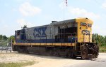 CSX 5867 has dropped off cars at a local industry